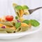 Italian cuisine eating colorful Penne Rigate noodles pasta meal