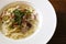 Italian cuisine, Spaghetti Cabana or Spaghetti White Sauce on white dish at restaurant