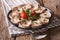 Italian cuisine: Vitello tonnato with capers, arugula, tomatoes