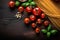Italian culinary inspiration, pasta, tomatoes on rustic background copy space