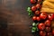 Italian culinary inspiration, pasta, tomatoes on rustic background copy space