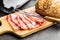 Italian dried ham. Coppa Stagionata on cutting board
