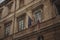 Italian and European flag on a building