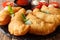 Italian fast food: fried panzerotti with tomato sauce, herbs and