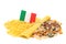 An Italian flag lies on a variety of pasta