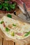 Italian flatbread piadina with prosciutto ham and mozzarella che