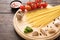 Italian food background, with tomato, garlic, pepper, spaghetti