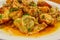 Italian food, homenade seafood tortellini with sauce