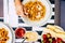 Italian food at restaurant or home viewed from above invertical pov - red colors for tomatoes sauce and maccheroni pasta with