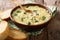 Italian food: soup stracciatella with farfalline and cheese close-up. horizontal