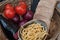 Italian food and wine. Spaghetti, tomato, bouquet, bread, wine.