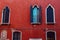 Italian Gothic window with wooden shutters