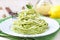 Italian green pasta spaghetti with pesto green peas, mint