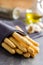 Italian grissini bread sticks seeds on kitchen table