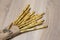 Italian grissini breadsticks on craft paper background