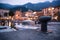 Italian harbour scene on the evening: cute village in the blurry background