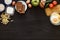 Italian healthy food table, spaghetti vegetables on black wooden desk, top view