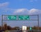 Italian highway with the road sign with directions to Udine and