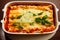 Italian homemade lasagna with basil in rectangular shape for baking