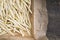 Italian homemade noodles fileja in packaging paper
