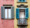 Italian house with colorful walls, windows and balcony