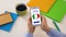 Italian language application on smartphone in persons hands, online education