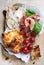 italian lifestyle; food background; mozzarella, prosciutto, tomato and focaccia