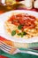 Italian macaroni pasta with tomato sauce