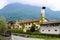 Italian MAndello del Lario houses with Alps mountains in background.