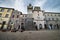 Italian medieval village details, historical stone square and ancient clock tower, old city stone buildings architecture. Santa