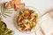 Italian Mediterranean salad with arugula, grain rustic cheese, batata, figs and peach. Healthy dinner, fresh vegan salad