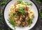Italian Mushroom risotto with parmesan cheese and wild rocket on top.