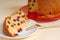 Italian Panettone Christmas bread with tan background