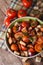 Italian panzanella bread salad close-up. vertical top view