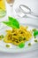 Italian pasta with basil pesto, late harvest wine