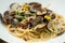 Italian pasta ditalini with black mussels