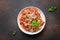 Italian pasta fettuccine with meatballs, cheese, tomatoes, basil. View from above