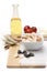 Italian pasta, macaroni farfalle with cherry tomatoes and olive oil in a glass bottle