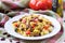 Italian pasta orecchiette with stew of vegetables and beans