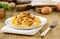 Italian pasta, pappardelle with hare sauce, selectiv focus