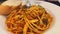 Italian pasta and pizza in a restaurant on the table