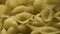 Italian Penne Rigate Macaroni Pasta food background or texture close up