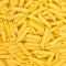 Italian Penne Rigate Macaroni Pasta raw food background or texture