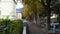 Italian people driving car on the road in small alley and movement of tree from wind