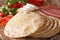 Italian piadina flat bread, ham, cheese and vegetables macro. ho