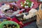 Italian picnic with red wine, Parmesan, ham, caprese salad and olives. Lunch in the open air and wooden table. Traditional snacks.