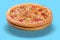 Italian pizza with bacon and salami, on a board, levitate, cast a shadow, on a blue background, concept, in pastel colors