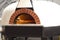 Italian pizza cooked in a traditional Wood Fired Oven.