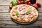 Italian pizza with tomato and salami