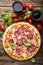 Italian pizza with tomato and salami